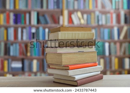 books on the table in library of university,Books on the table, library, school, education, pupil, student, encyclopedia, knowledge, learning, brown book,
​