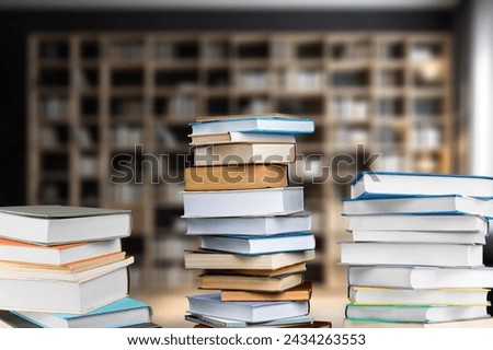Books, notebooks lie in library background