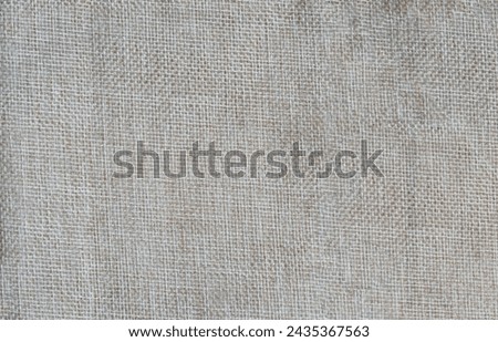 Light brown sackcloth background. Soft texture. Brown sackcloth background.