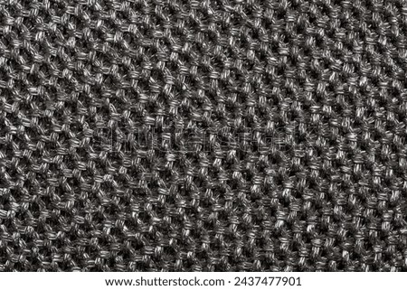 The texture of the silver sweater fabric for the background