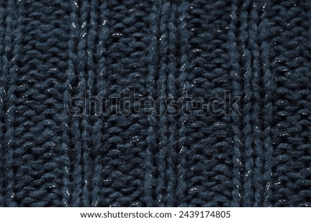 Texture of dark grey knitted fabric as background. Banner for design.