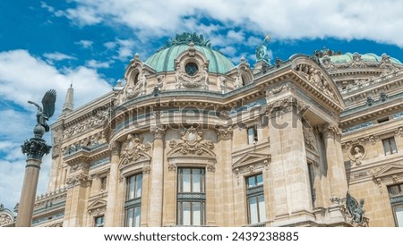 Palais or Opera Garnier The National Academy of Music timelapse in Paris, France. Side view looking up perspective with clouds on a blue sky