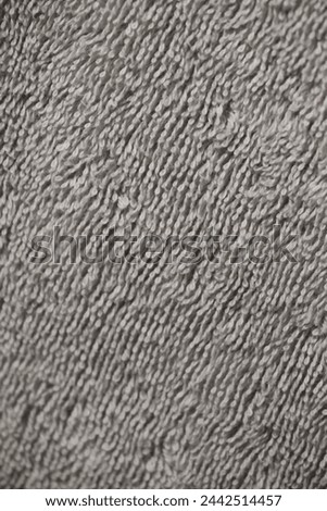 Stylish natural light grey fabric with a subtle pattern. Perfect as a background. GoranOfSweden