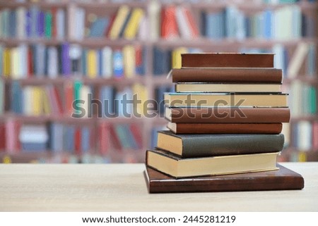 Books on the table in library, education, school