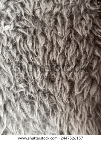 Fuzzy grey blanket material background
