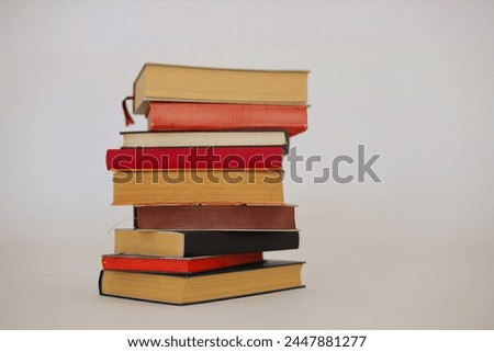 Stack of books on white background, nice books to read, afternoons resting, books for the beach, studying