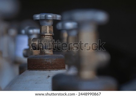 oxygen cylinder valve metallic obgect