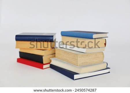 stack of books on white background, editorial, education