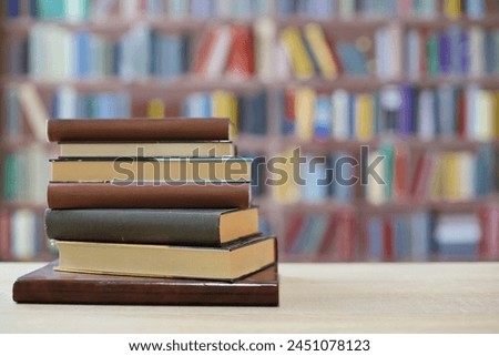Books on the table in library, education, school