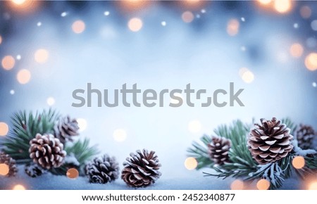 Snowy pine cones and branches with blurred holiday lights in the background