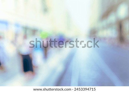 CITY STREET BLURRED BACKGROUND WITH CROWD OF PEOPLE STANDING IN THE STREET, OUTDOOR LIFESTYLE BACKDROP