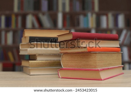 stack of books in library