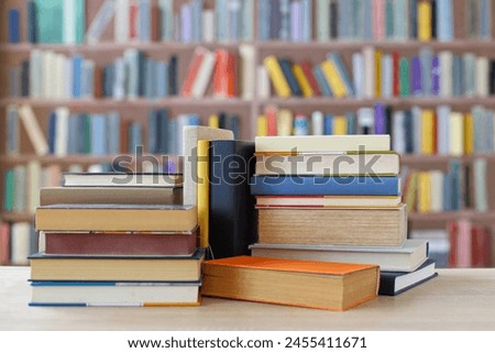 pile of books on the table in library, wonderful books for school, science and history, education