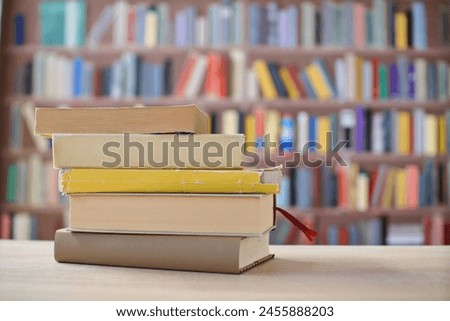 Stack of yellow books on the table