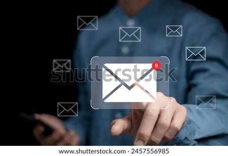 New email notification concept for business e-mail communication and digital marketing. Inbox receiving electronic message alert. business people touch on email in virtual screen. internet technology.