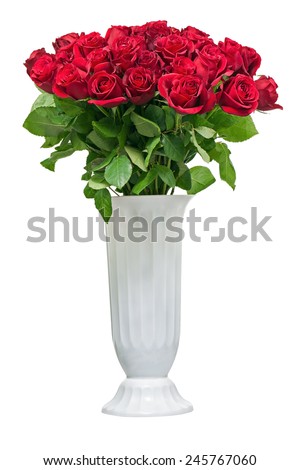 Colorful flower bouquet from red roses in white vase isolated on white background.