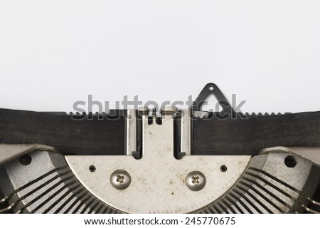 Blank Paper in Typewriter Closeup