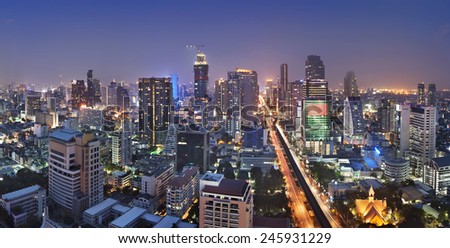 Bangkok   city  rooftop view  at night .  This is beautiful city at  night , Many hotel, temple and height  building for business  stand in the heart of Bangkok,Thailand.