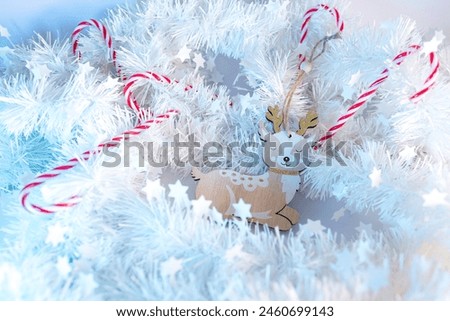 Christmas decoration of a deer and candy sticks 