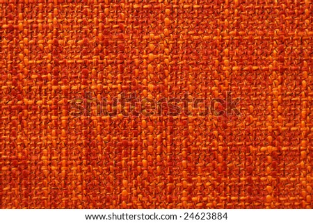 Close-up bright orange fabric background