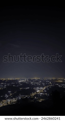view of the city at night from a height