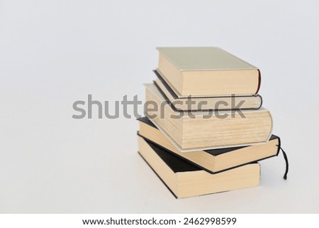 Books on white background, education