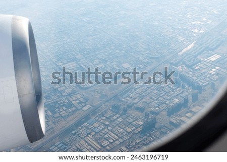 View of Dubai City from an airplane window.