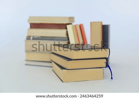 stack of books on white background, education