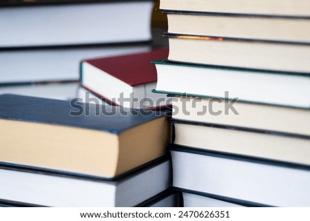 many books standing on the covers, top view