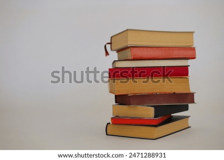 book, stack of different books on the table
