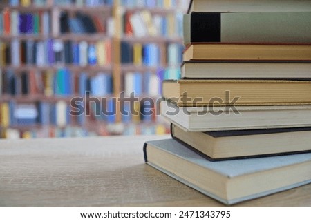 book, books on wooden table in library, education