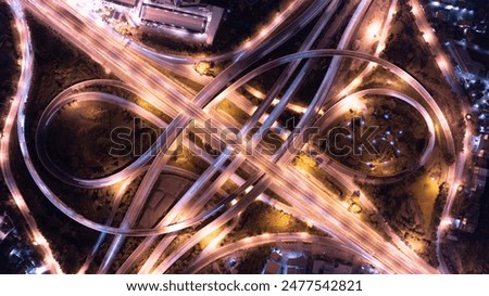 Expressway top view, Road traffic an important infrastructure, Drone aerial view fly in circle, traffic transportation, Public transport or commuter city life concept of economic and energ, transport