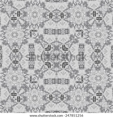 Rectangular decorative repeating kaleidoscopic black and white pattern for design and background