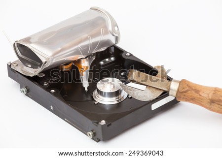 broken hard drive and can opener
