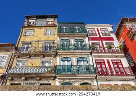 The typical colorful buildings of the Ribeira District in Porto, Portugal. Unesco World Heritage Site.