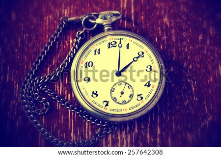 Antique vintage pocket watch on a chain