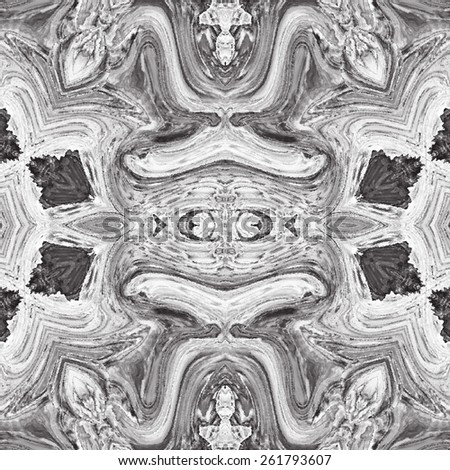 Repeating kaleidoscopic black and white background for design