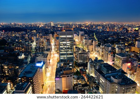 Tokyo urban skyscraper skyline rooftop view at night, Japan.