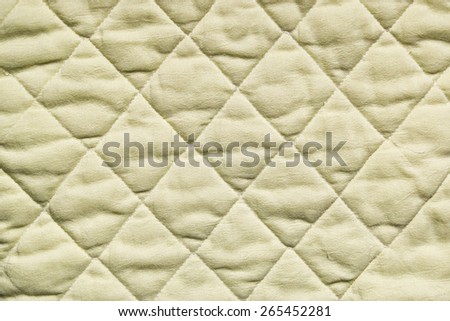 Texture of stitched fabric squares
