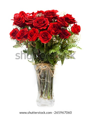 bouquet of blossoming dark red roses in vase isolated on white background