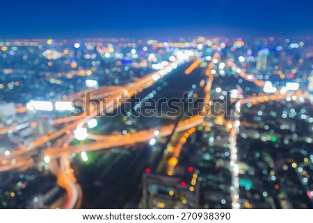 Out off focused, express way to city at night