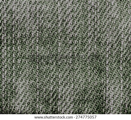 worn green-gray denim texture closeup. Can be used as background for design-works