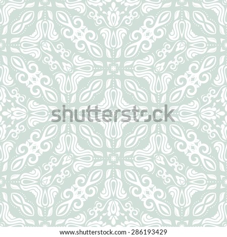 Oriental  fine pattern with damask, arabesque and floral elements. Seamless abstract background. Blue and white colors