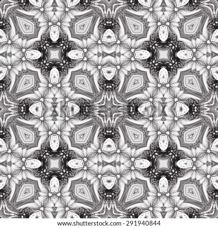 Seamless kaleidoscopic black and white pattern for design and background