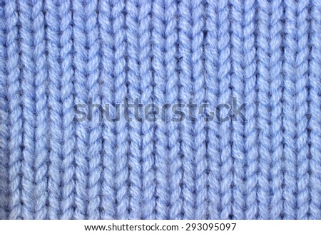 knitted pattern of woolen thread closeup