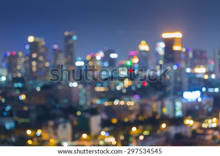 Blurred unfocused city view at night, abstract bokeh background