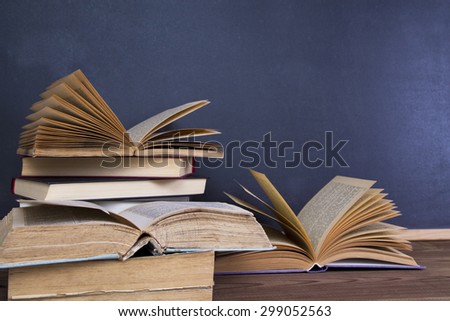 blackboard and books on desk