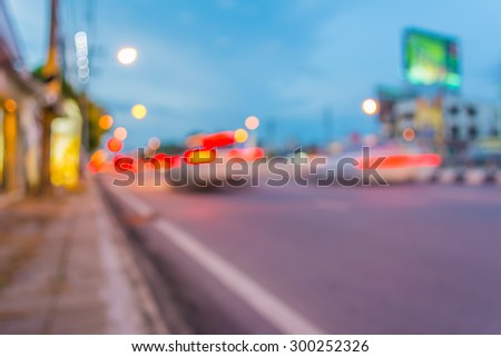 blur image of street light on twilight time in Thailand for background usage .