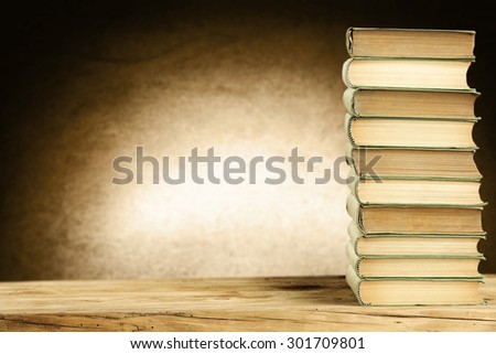 old paper of books on wooden table 
