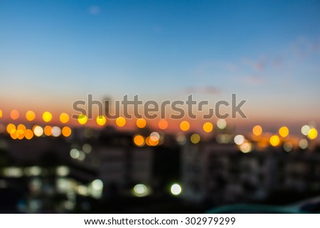 bokeh of city and bridge before sunset background